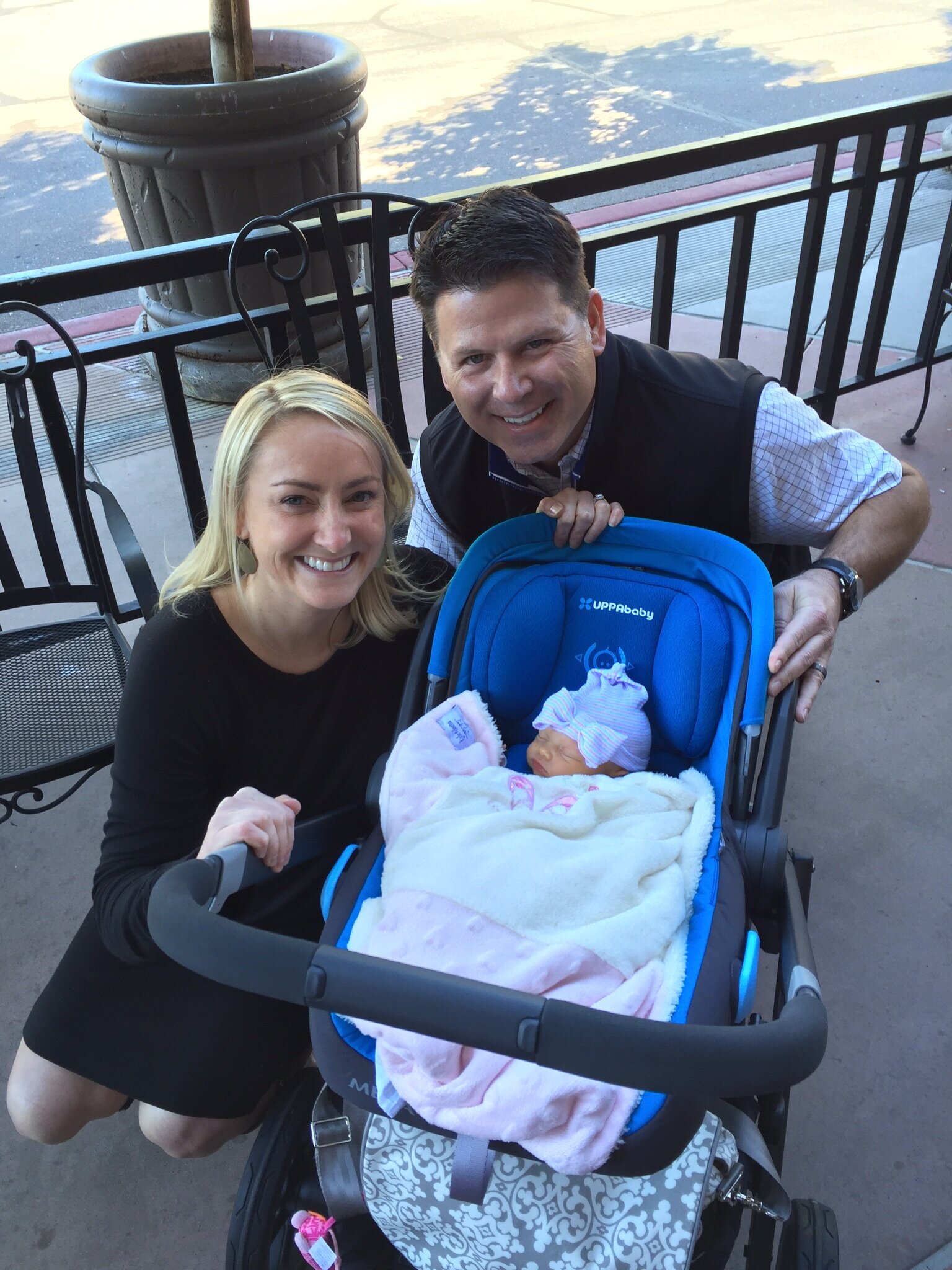 Our baby girl in her blue carseat